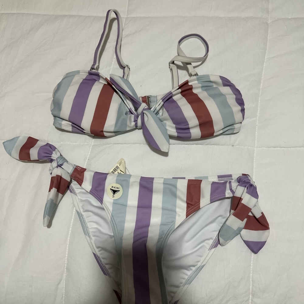 full coverage bottoms w ties on side, top has adjustable straps